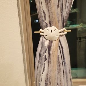 Beach style curtain tie.